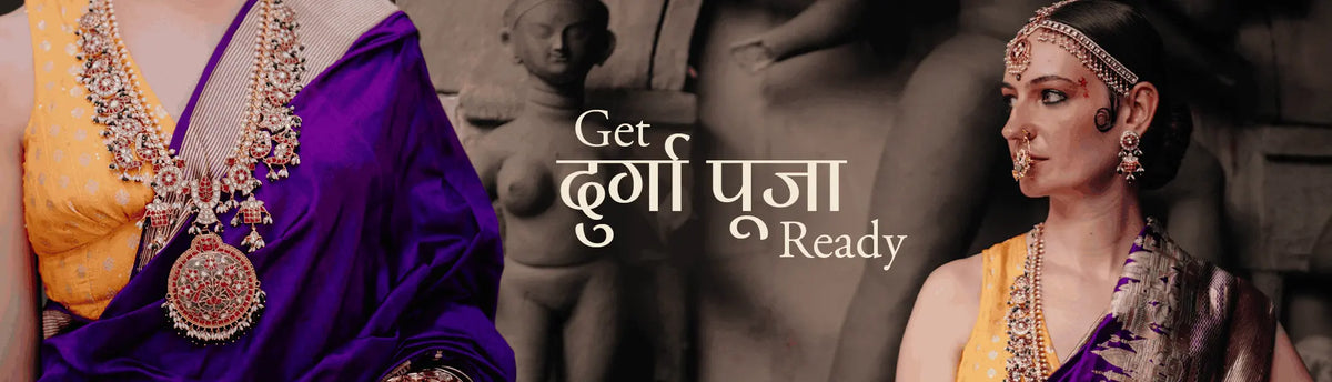 Mortantra Durga Puja jewellery campaign featuring a model in a purple saree wearing traditional necklaces and Bengali festive jewellery